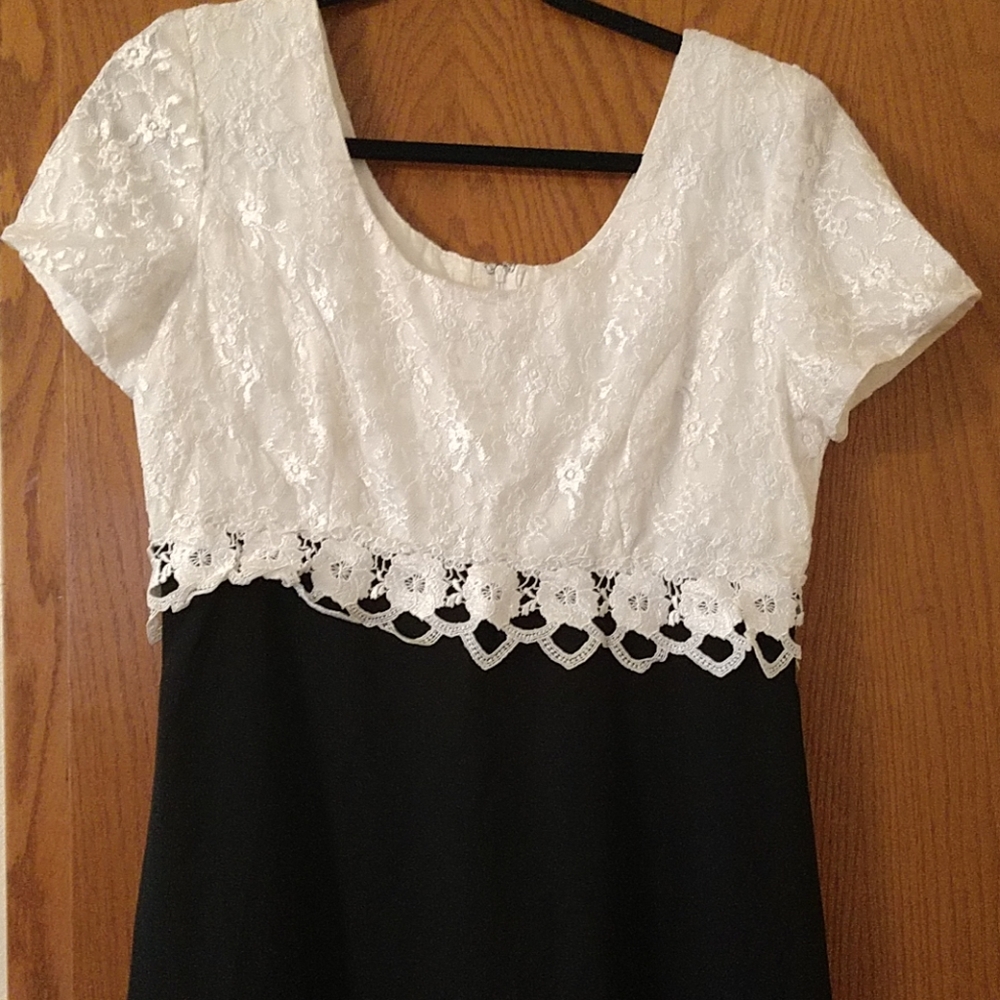 White lace and black costume dress